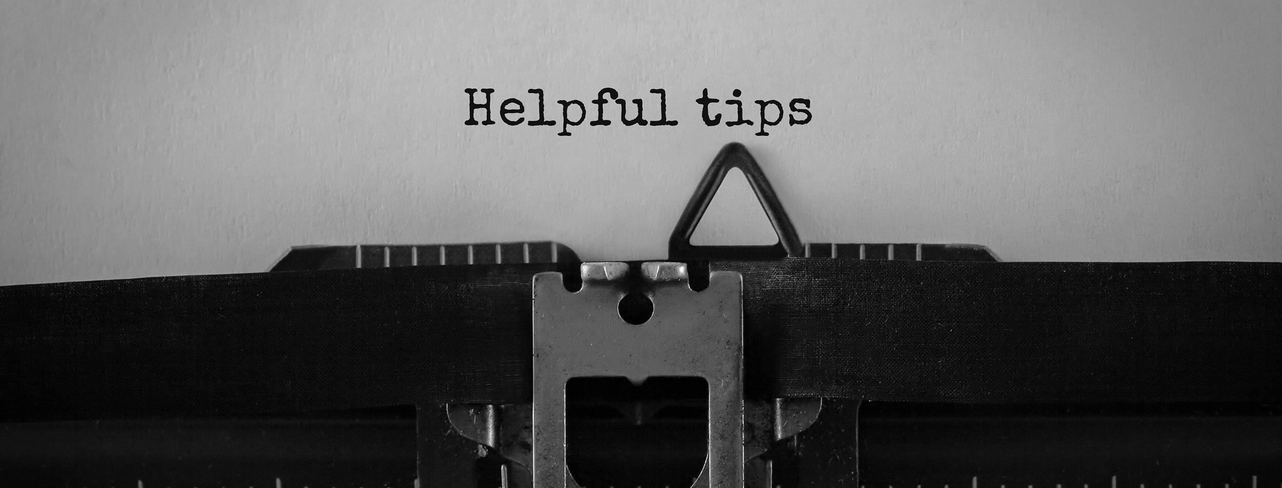 typewriter typing out tips for buyers