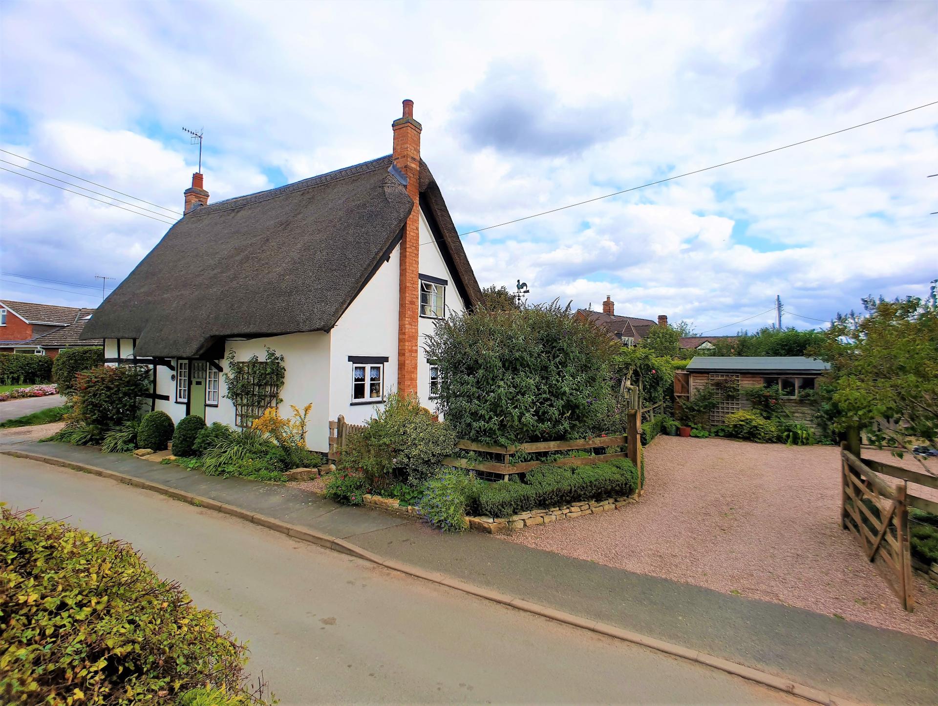 pretty english thatched cottage