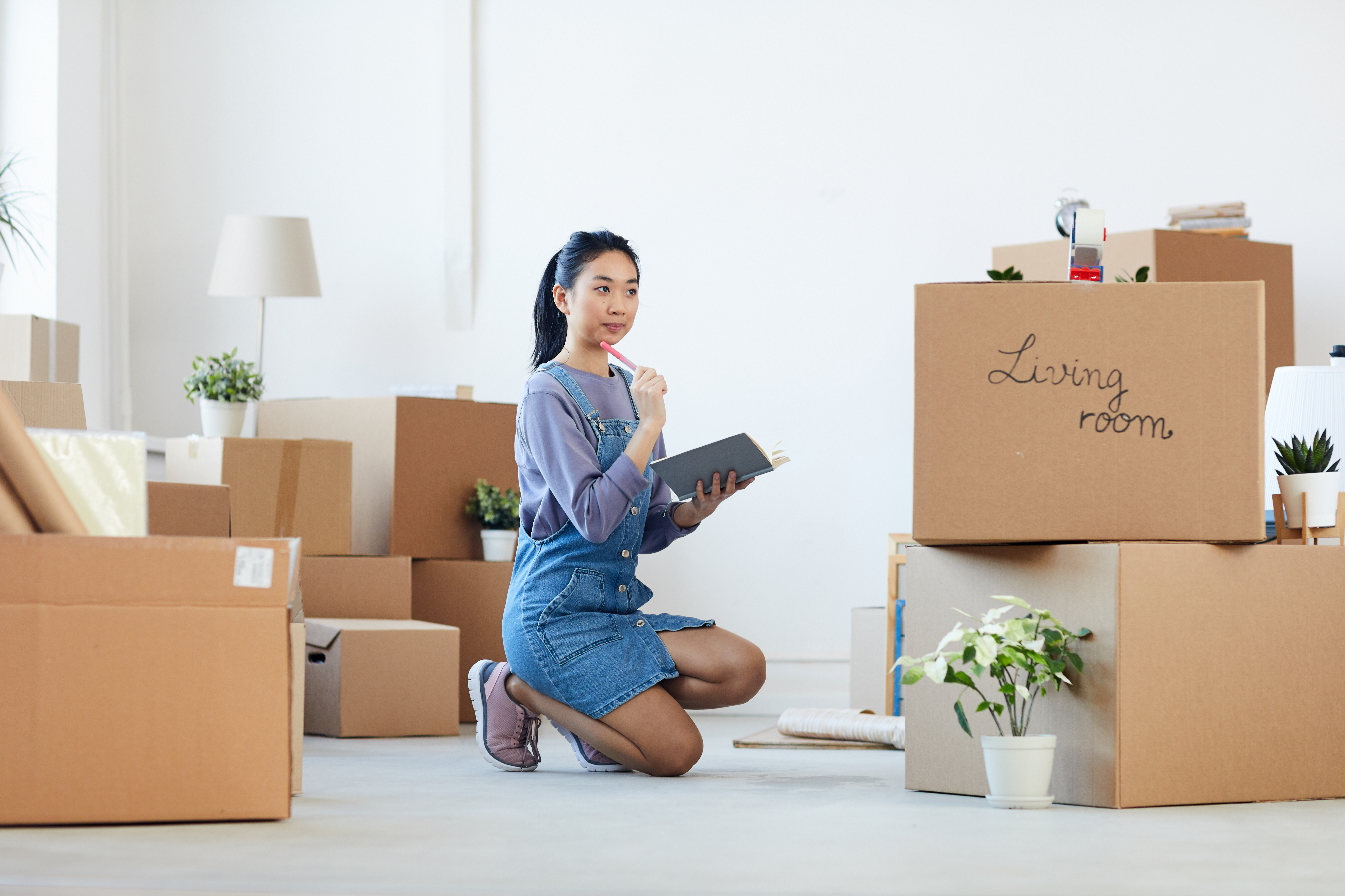 young woman organised moving house